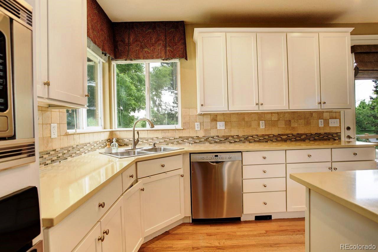Arvada, Colorado, 80005, United States, 4 Bedrooms Bedrooms, ,2 BathroomsBathrooms,Residential,For Sale,1906341