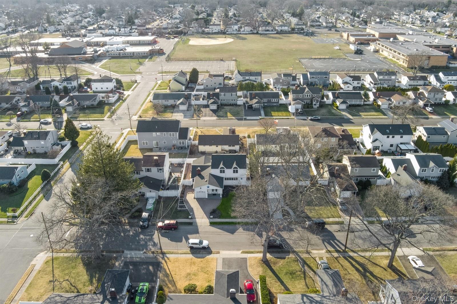 Massapequa Park, New York, 11762, United States, 3 Bedrooms Bedrooms, ,4 BathroomsBathrooms,Residential,For Sale,1941074