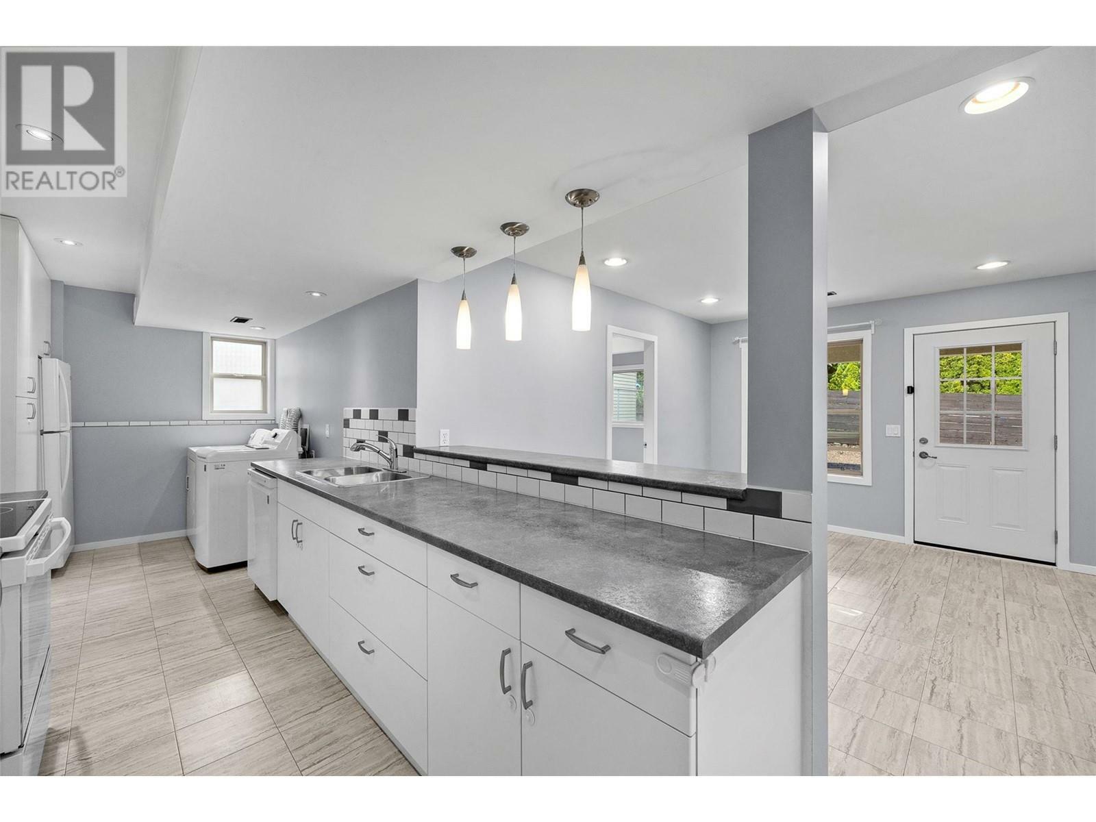 KELOWNA, British Columbia, V1P 1N8, CA, 6 Bedrooms Bedrooms, ,4 BathroomsBathrooms,Residential,For Sale,1837090