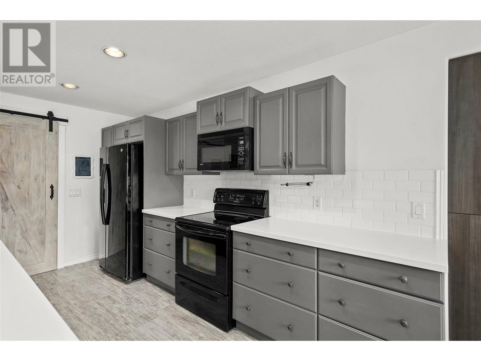 KELOWNA, British Columbia, V1P 1N8, CA, 6 Bedrooms Bedrooms, ,4 BathroomsBathrooms,Residential,For Sale,1837090