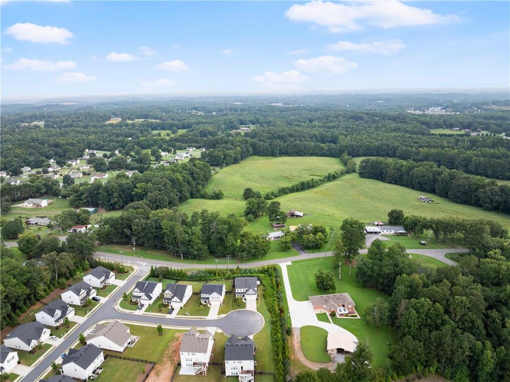 Cumming, Georgia, 30028, United States, 5 Bedrooms Bedrooms, ,4 BathroomsBathrooms,Residential,For Sale,1944997