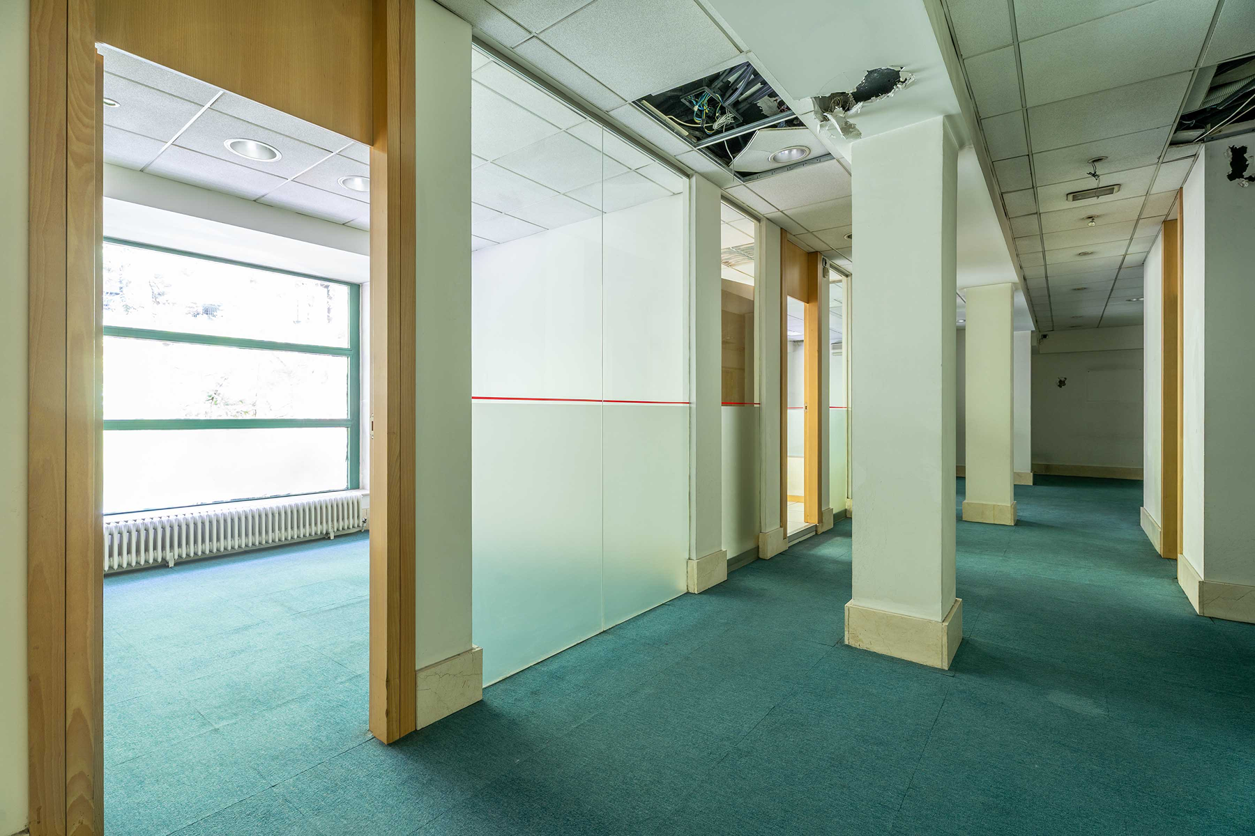  Recoletos: transformable office into a home with 9 windows. Madrid - 物件實景