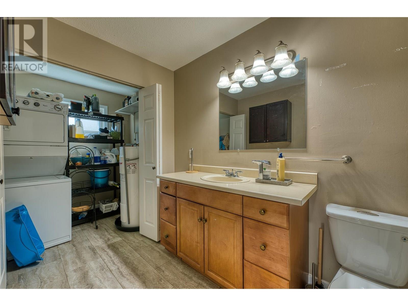 KELOWNA, British Columbia, V1Y 6S9, CA, 5 Bedrooms Bedrooms, ,3 BathroomsBathrooms,Residential,For Sale,1876948