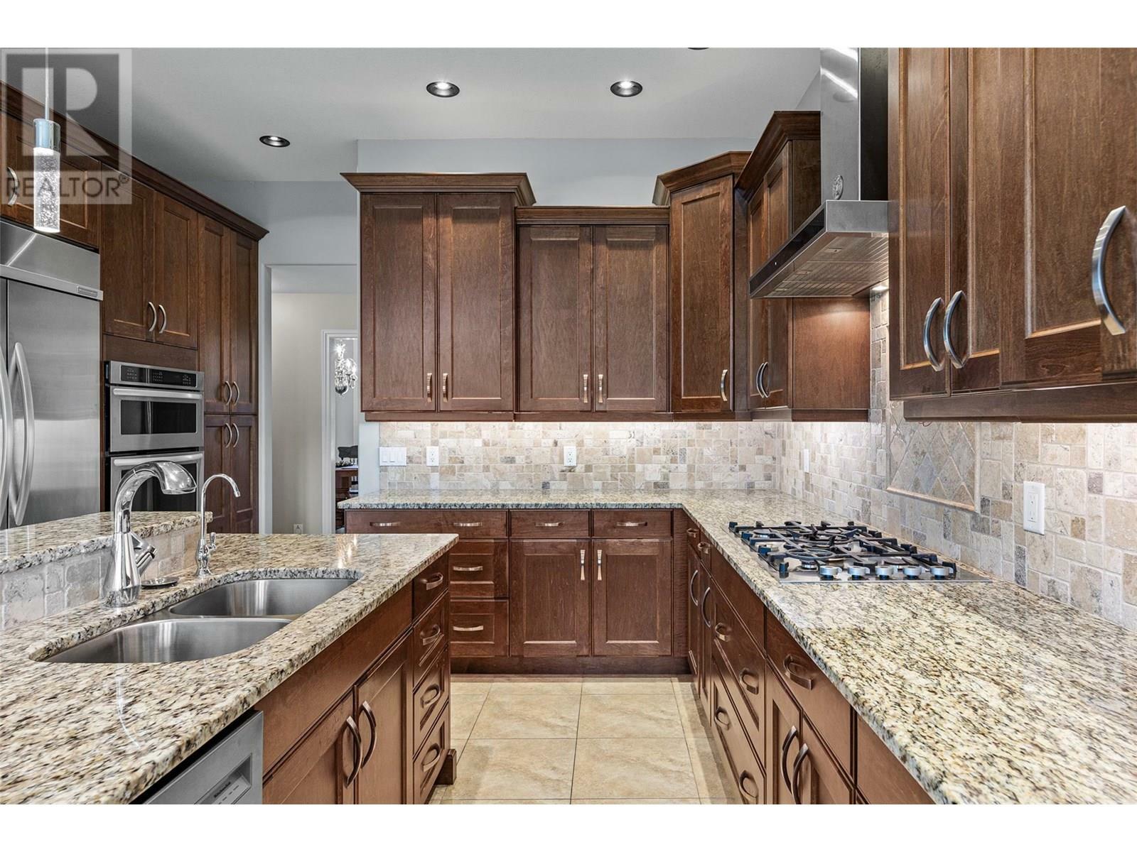 KELOWNA, British Columbia, V1V 1W2, CA, 4 Bedrooms Bedrooms, ,3 BathroomsBathrooms,Residential,For Sale,1882323
