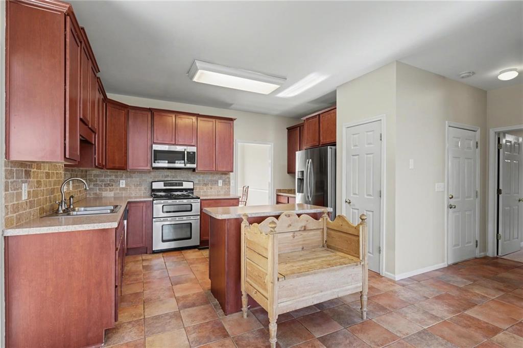 Kennesaw, Georgia, 30144, United States, 5 Bedrooms Bedrooms, ,3 BathroomsBathrooms,Residential,For Sale,2011706