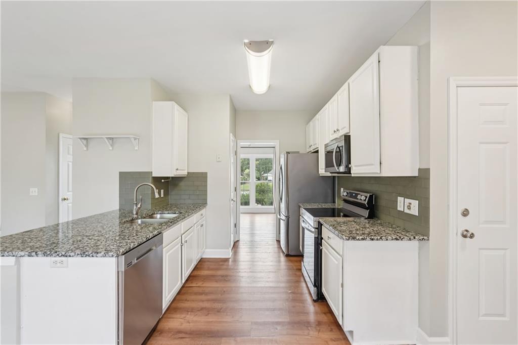 Alpharetta, Georgia, 30004, United States, 4 Bedrooms Bedrooms, ,3 BathroomsBathrooms,Residential,For Sale,1978370