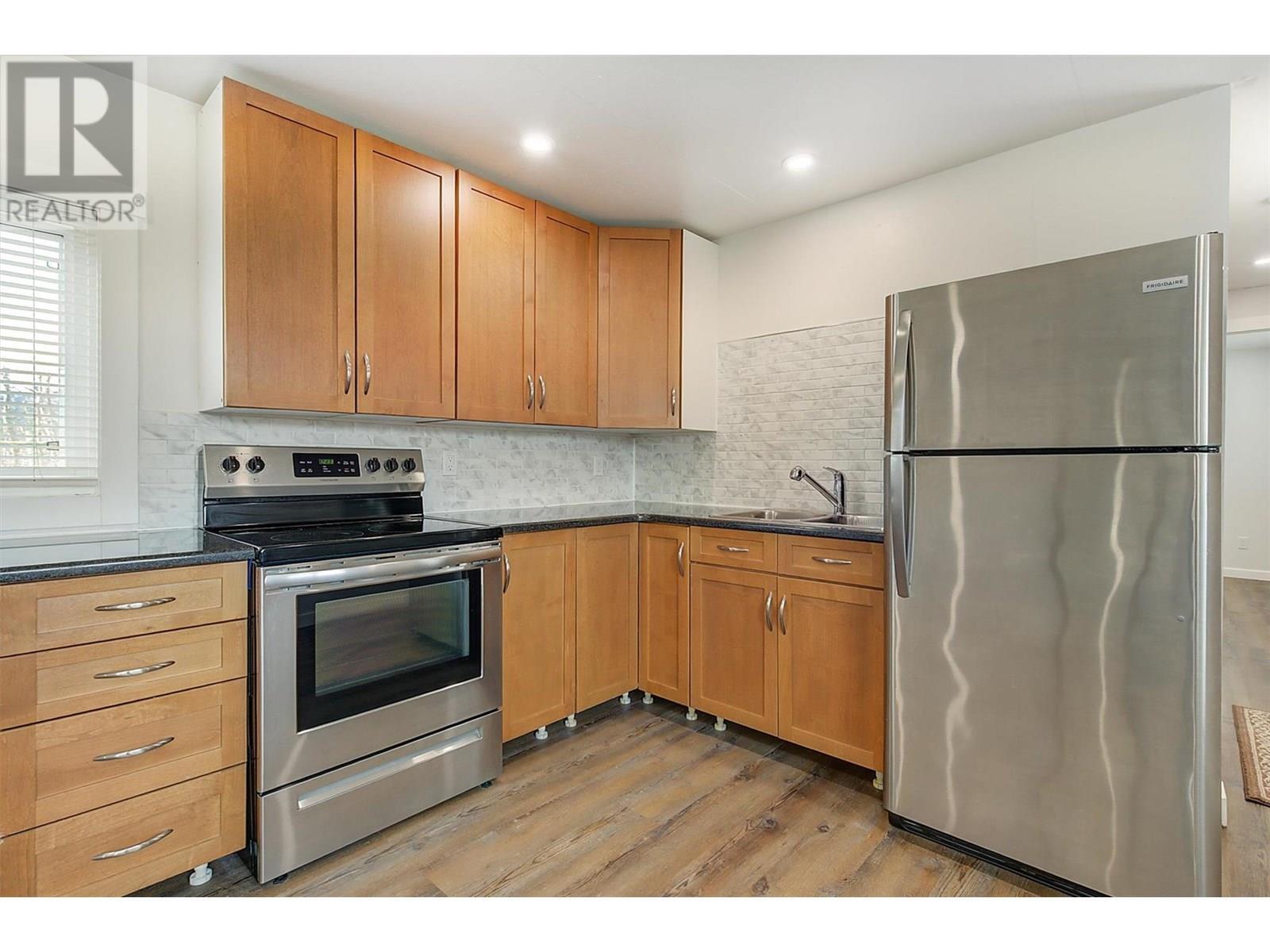 KELOWNA, British Columbia, V1V 2G6, CA, 5 Bedrooms Bedrooms, ,4 BathroomsBathrooms,Residential,For Sale,1838438