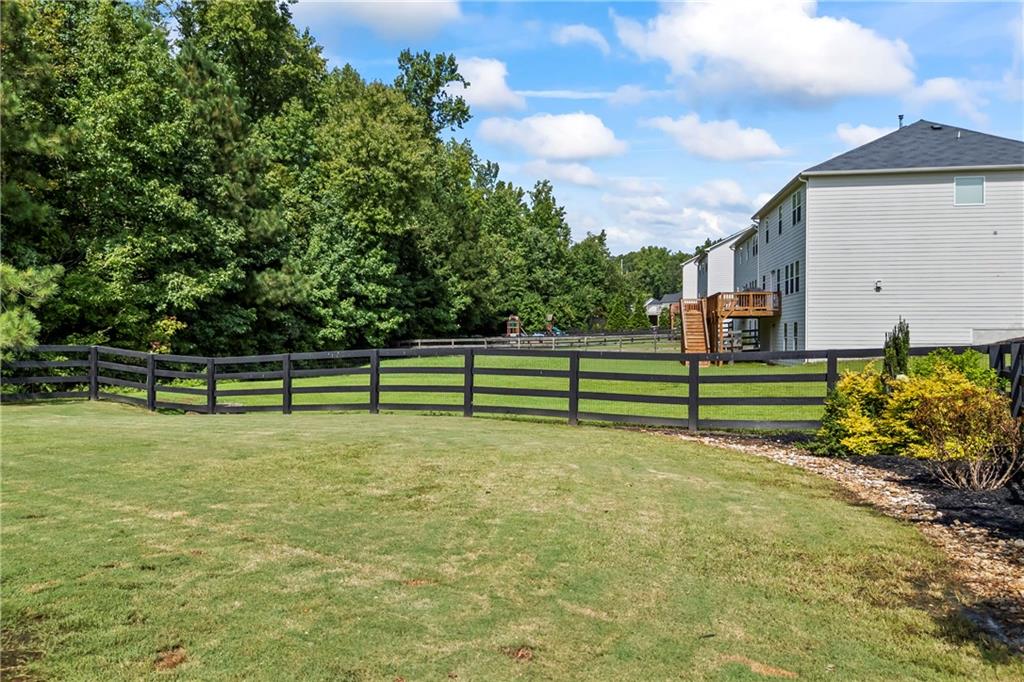 Cumming, Georgia, 30028, United States, 5 Bedrooms Bedrooms, ,4 BathroomsBathrooms,Residential,For Sale,1976985
