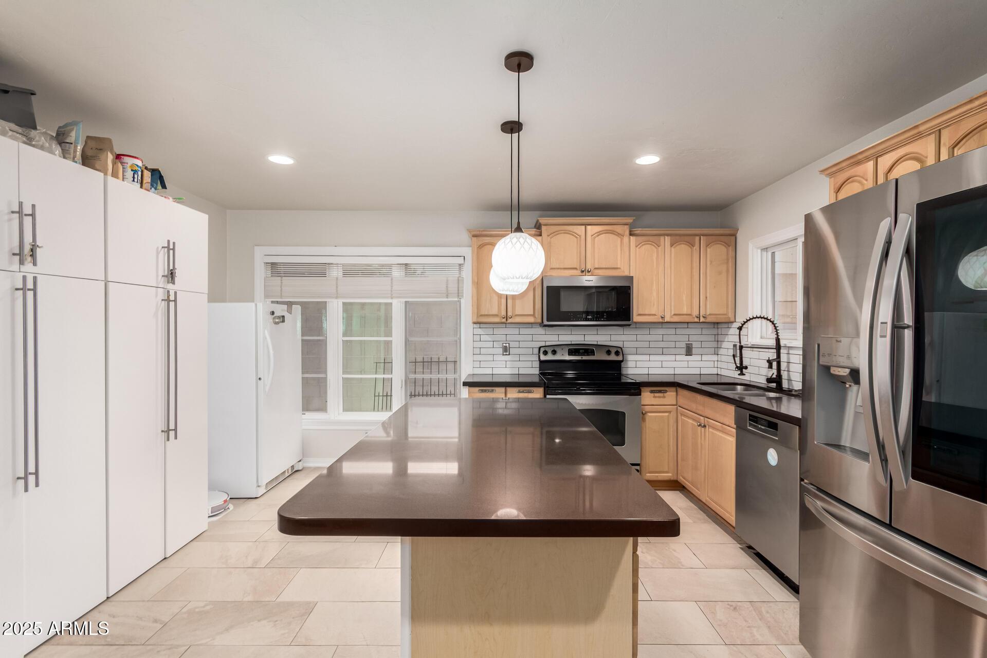 Phoenix, Arizona, 85007, United States, 4 Bedrooms Bedrooms, ,3 BathroomsBathrooms,Residential,For Sale,1980366