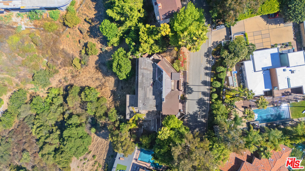 Los Angeles, California, 90049, United States, 4 Bedrooms Bedrooms, ,4 BathroomsBathrooms,Residential,For Sale,1903747