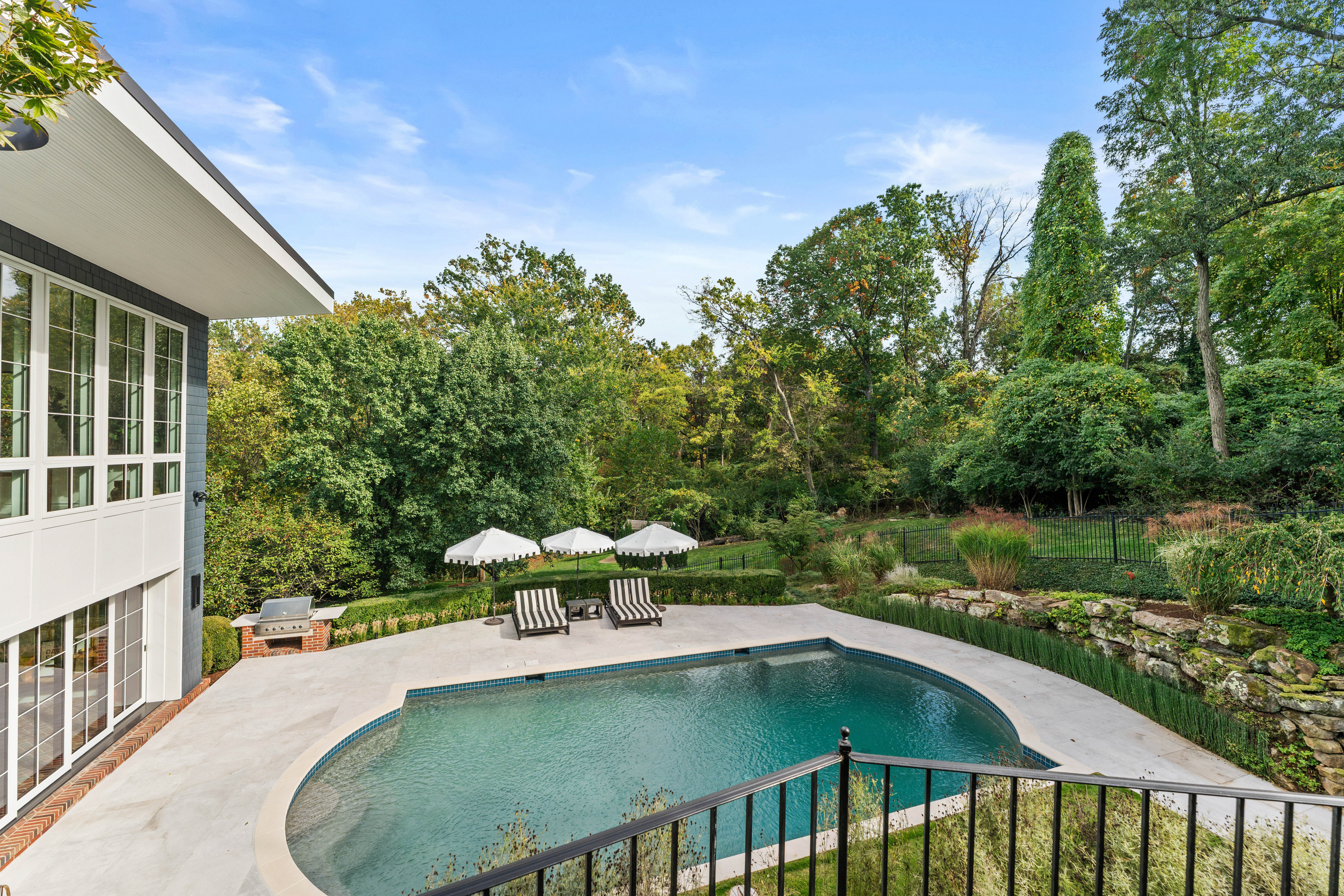  Stunning Private Estate Tucked Away on one of Ladue