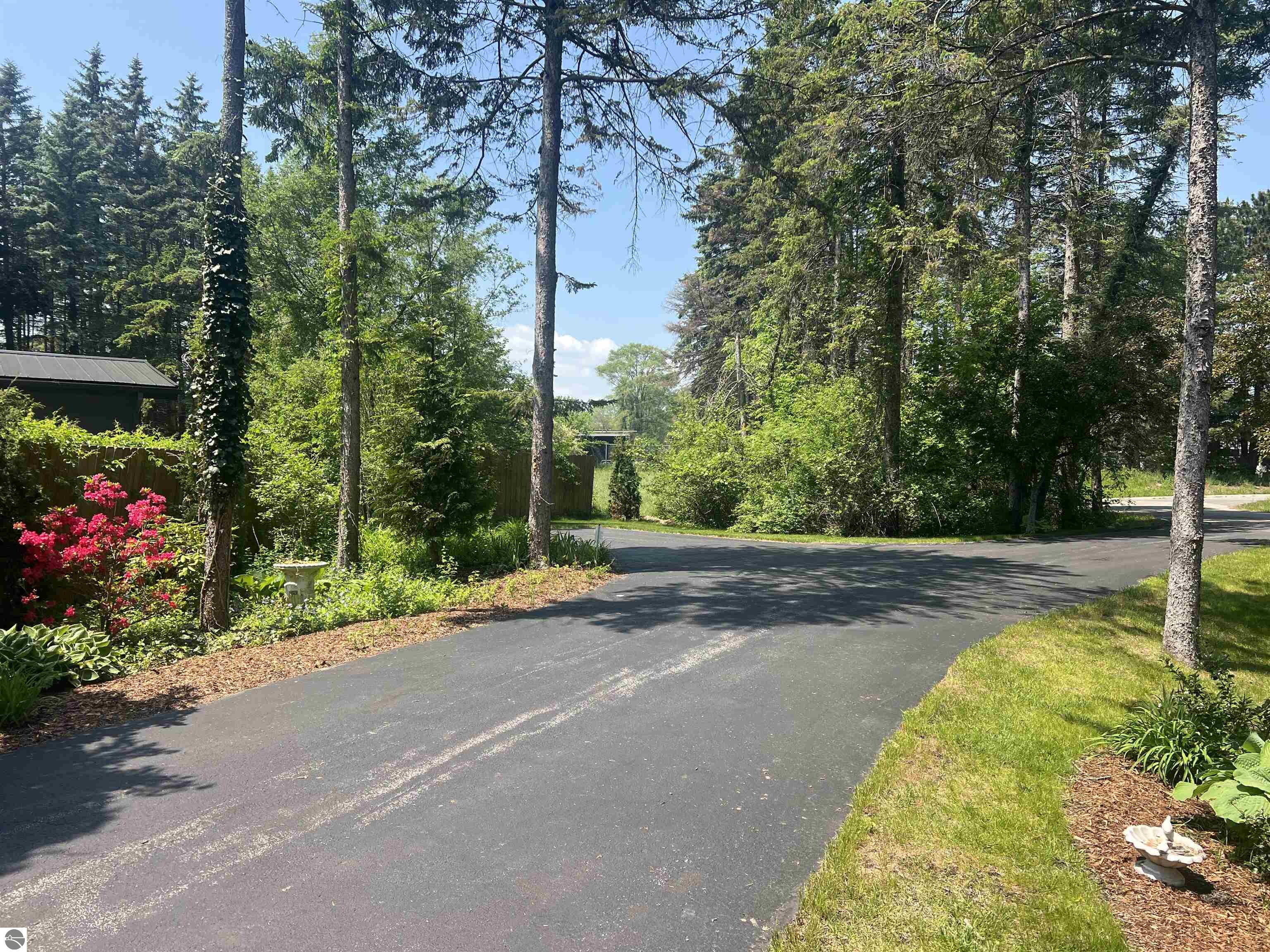 Traverse City, Michigan, 49686, United States, 4 Bedrooms Bedrooms, ,3 BathroomsBathrooms,Residential,For Sale,1883605