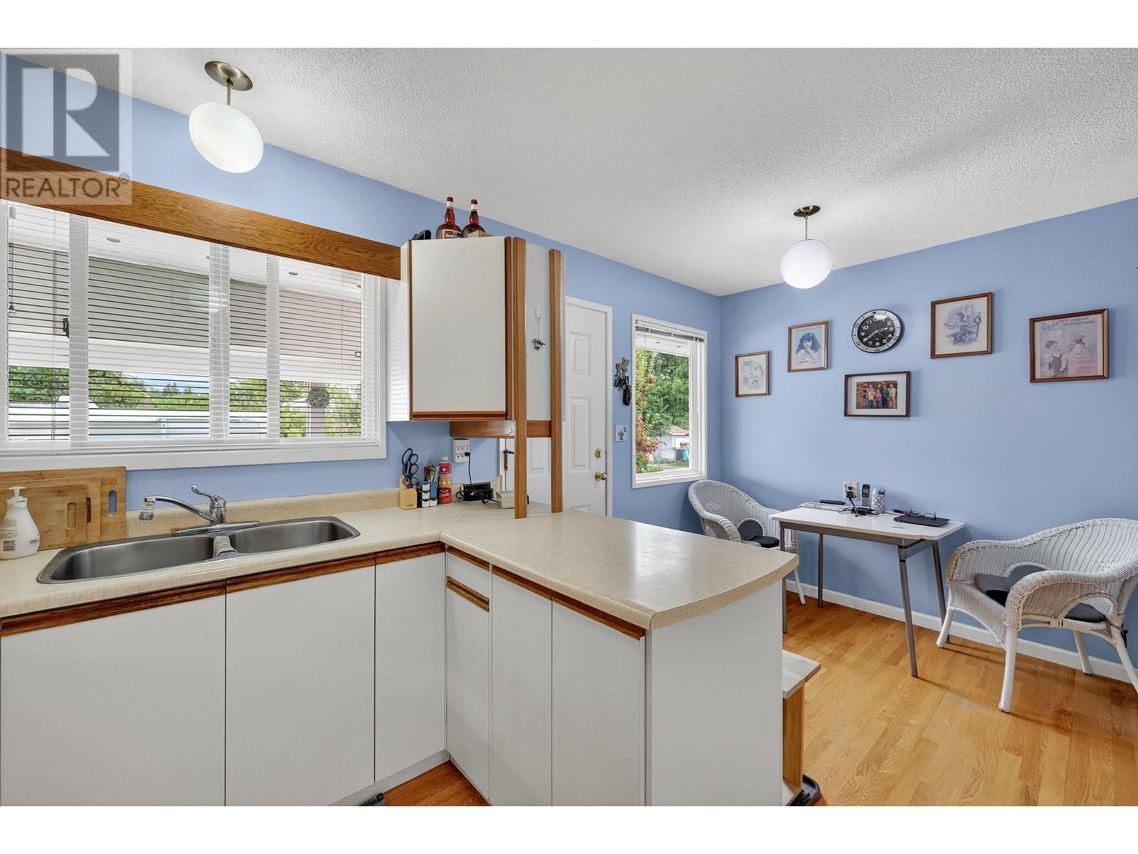 KELOWNA, British Columbia, V1Y 3S7, CA, 5 Bedrooms Bedrooms, ,2 BathroomsBathrooms,Residential,For Sale,1902795