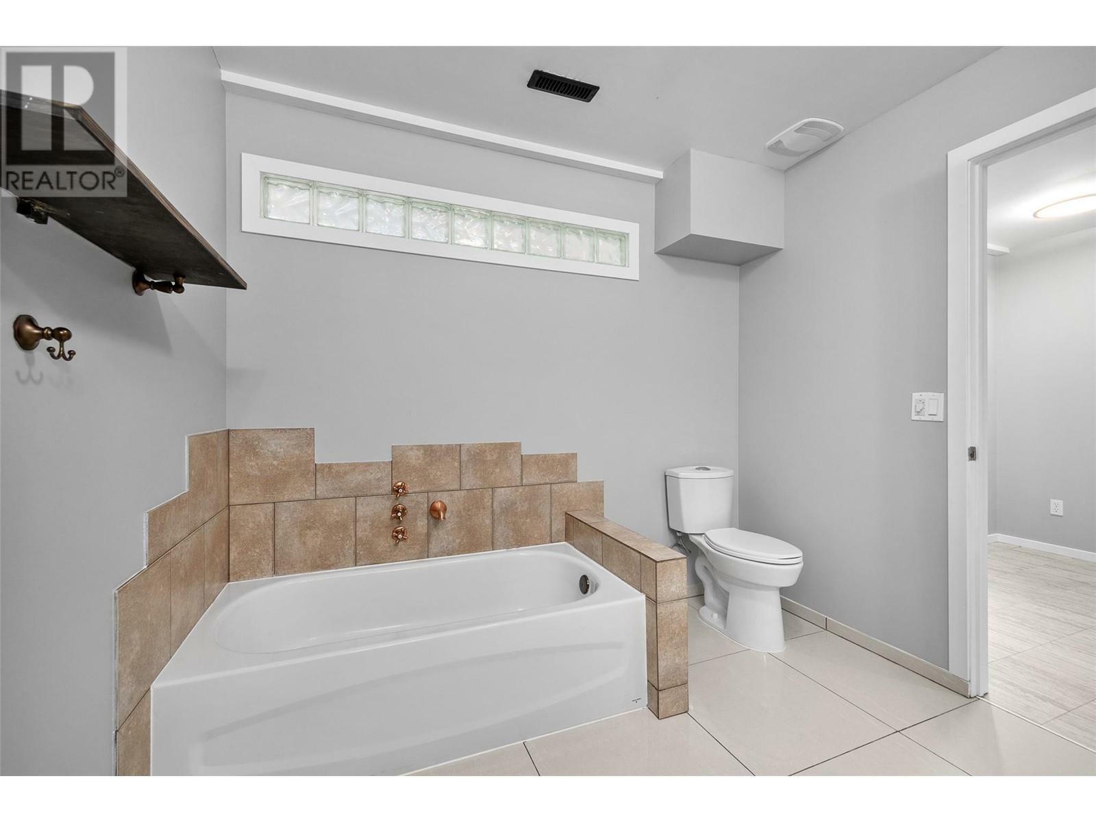 KELOWNA, British Columbia, V1P 1N8, CA, 6 Bedrooms Bedrooms, ,4 BathroomsBathrooms,Residential,For Sale,1837090