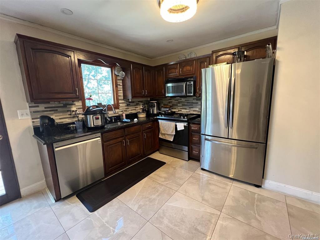 Farmingville, New York, 11738, United States, 4 Bedrooms Bedrooms, ,2 BathroomsBathrooms,Residential,For Sale,1840283
