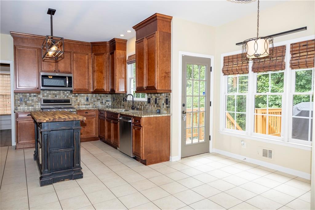 Suwanee, Georgia, 30024, United States, 5 Bedrooms Bedrooms, ,4 BathroomsBathrooms,Residential,For Sale,2005954