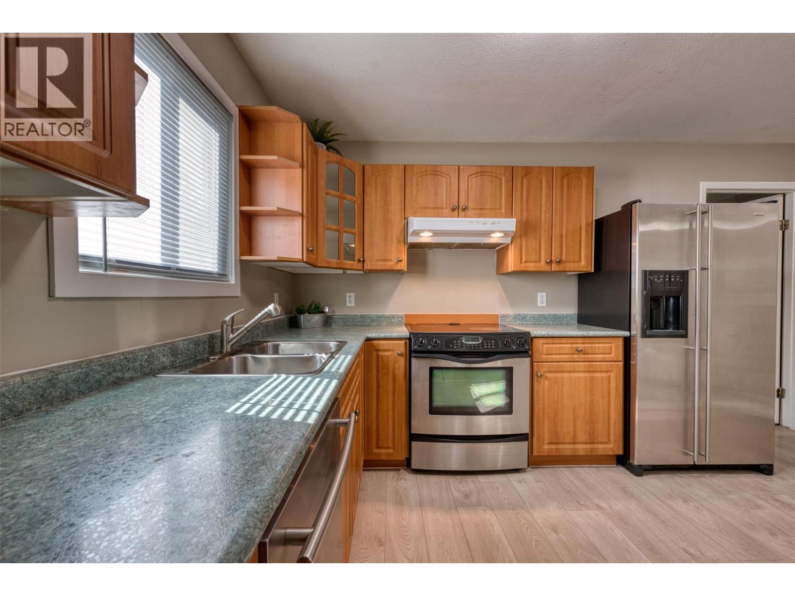 KELOWNA, British Columbia, V1Y 6S9, CA, 5 Bedrooms Bedrooms, ,3 BathroomsBathrooms,Residential,For Sale,1876948