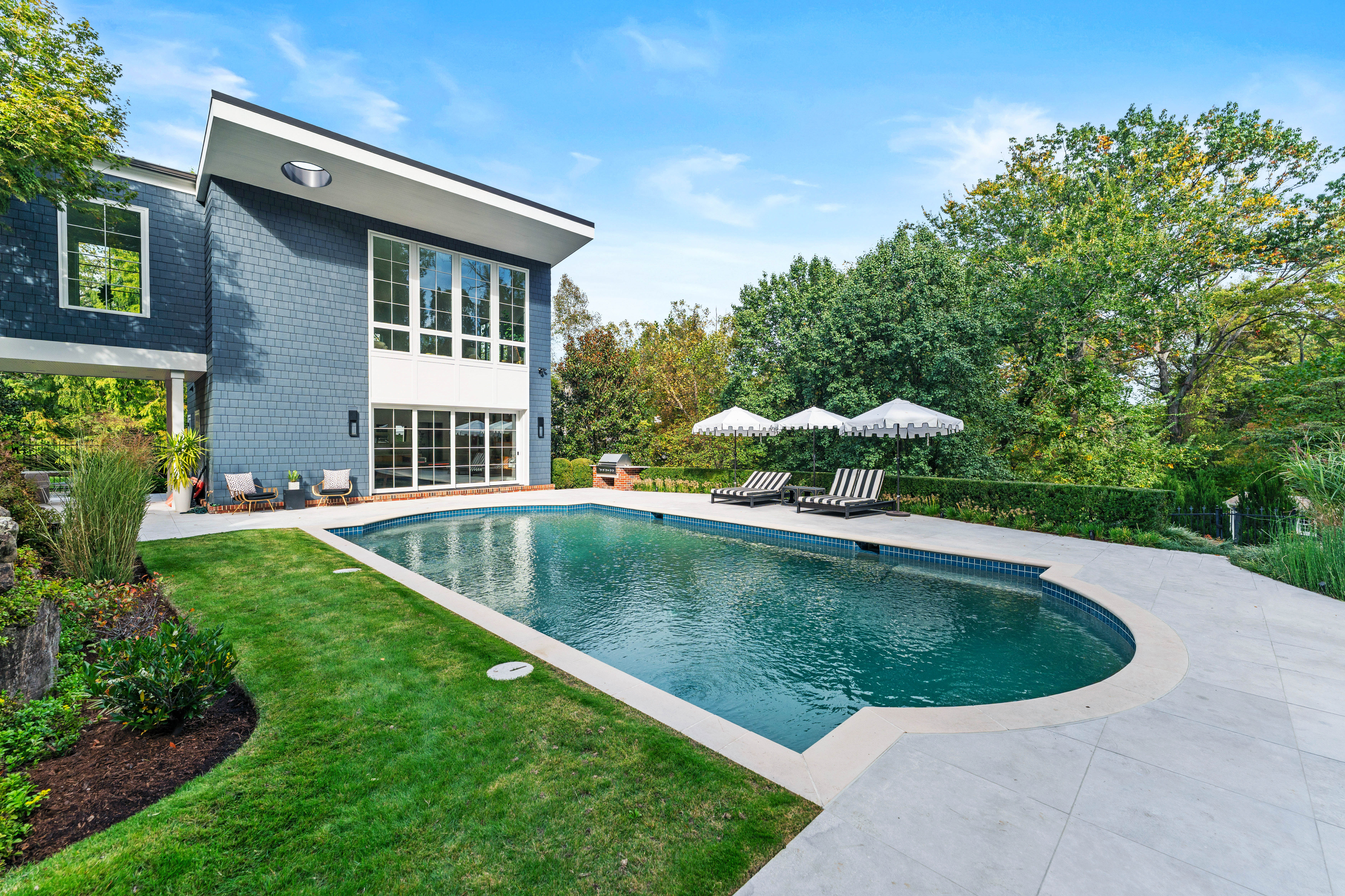  Stunning Private Estate Tucked Away on one of Ladue