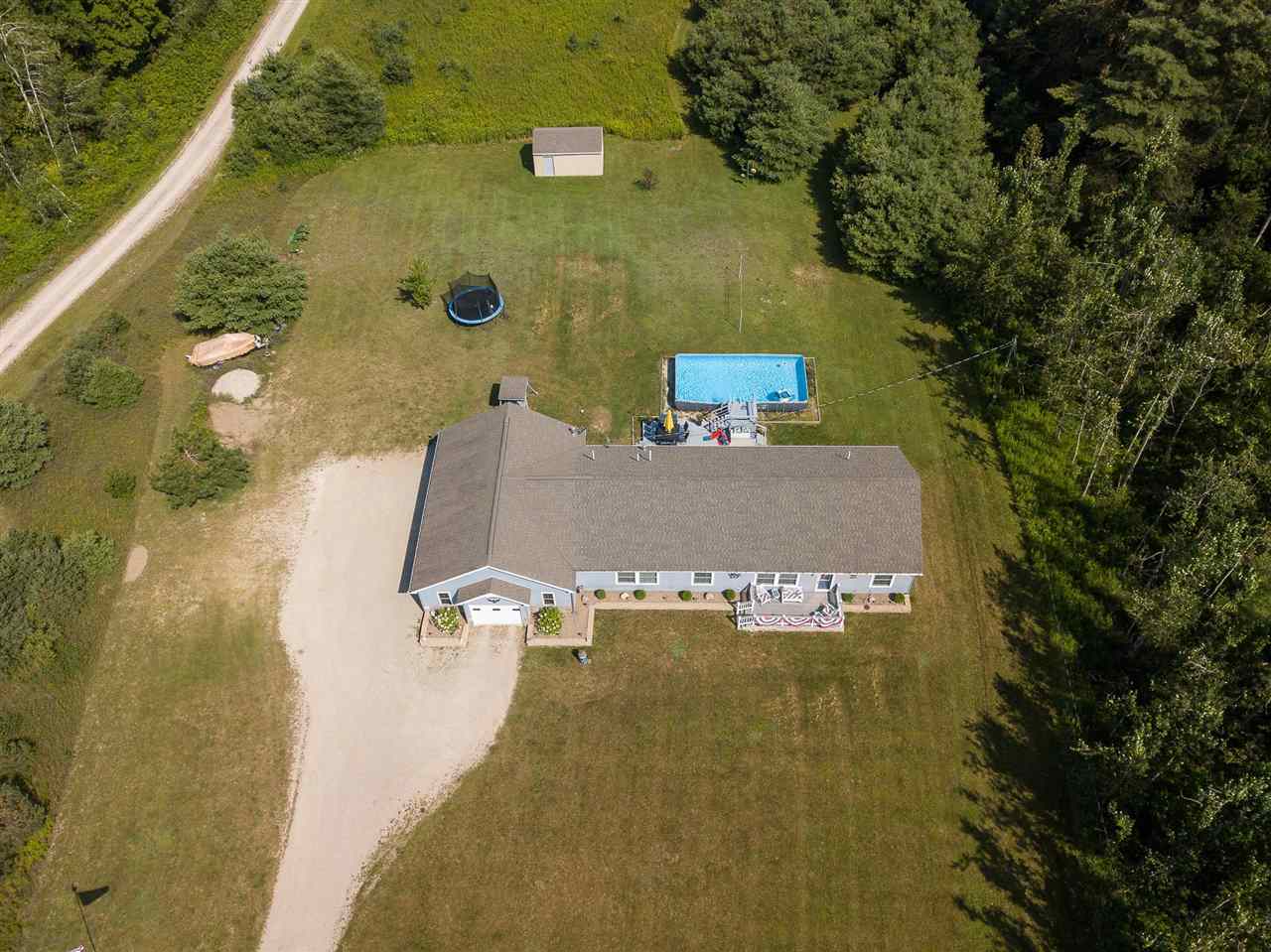 Petoskey, Michigan, 49770, United States, 4 Bedrooms Bedrooms, ,2 BathroomsBathrooms,Residential,For Sale,1925447