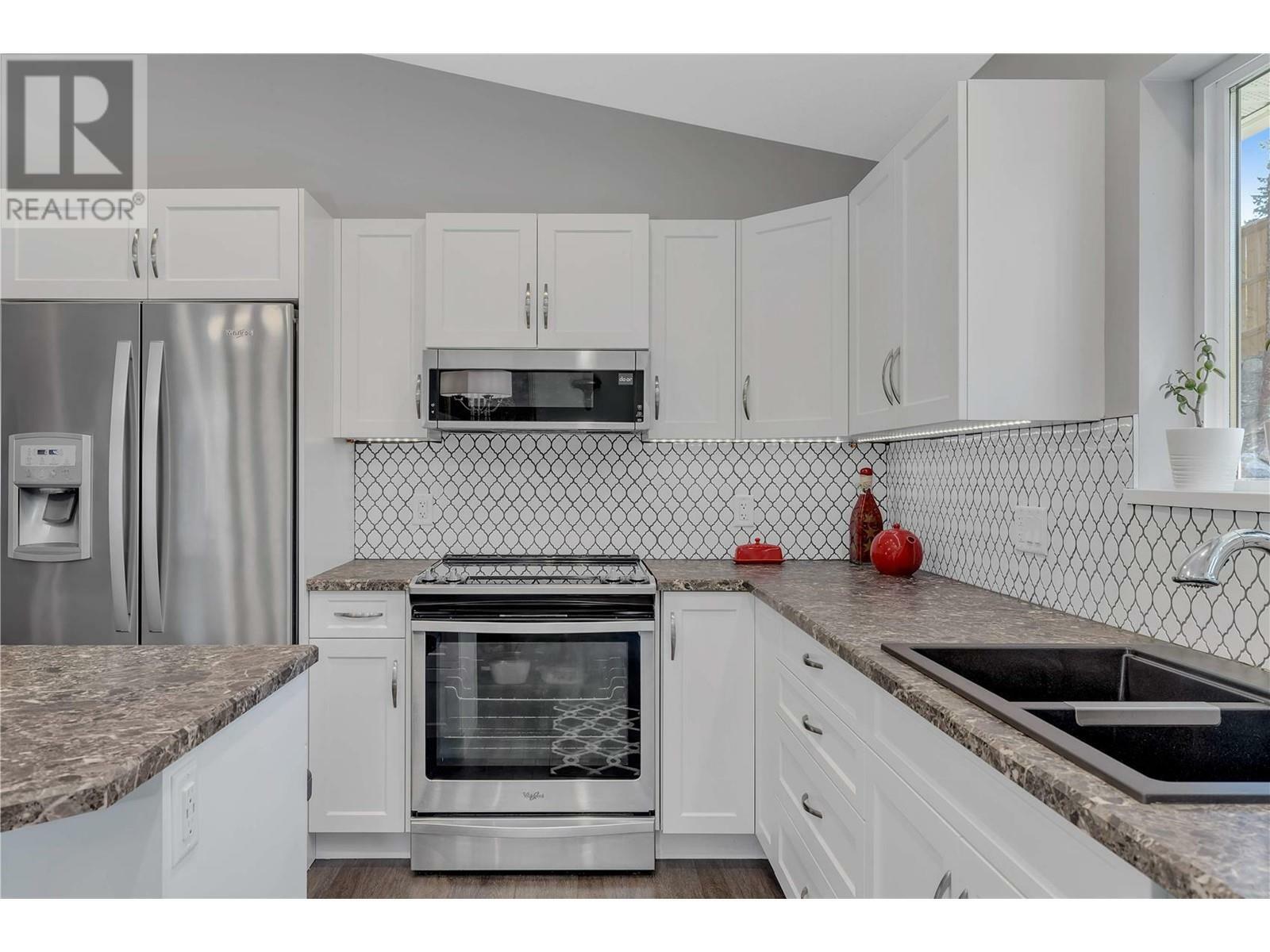 KELOWNA, British Columbia, V1Z 3W6, CA, 5 Bedrooms Bedrooms, ,3 BathroomsBathrooms,Residential,For Sale,1838987