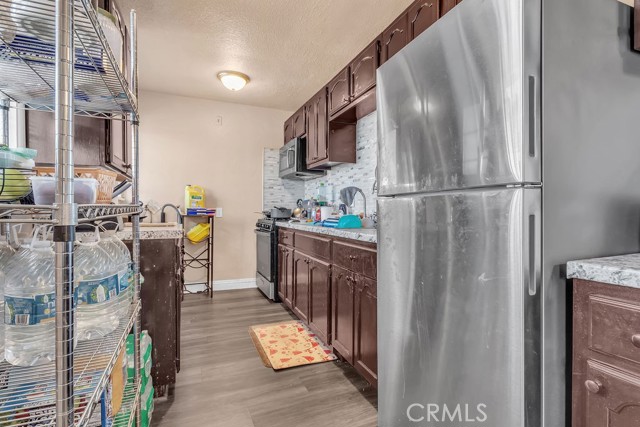 Los Angeles, California, 90044, United States, 4 Bedrooms Bedrooms, ,Residential,For Sale,2040182