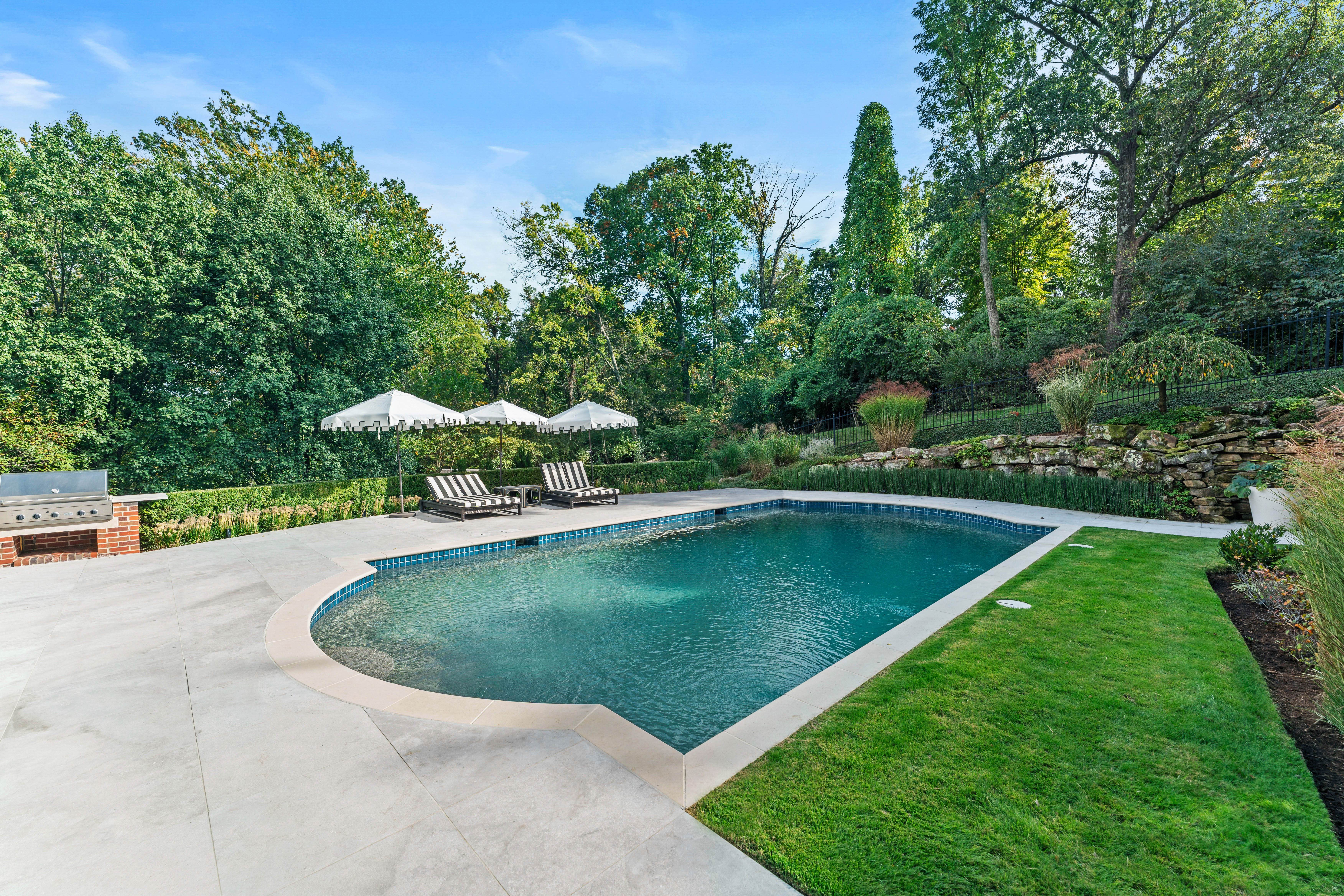  Stunning Private Estate Tucked Away on one of Ladue
