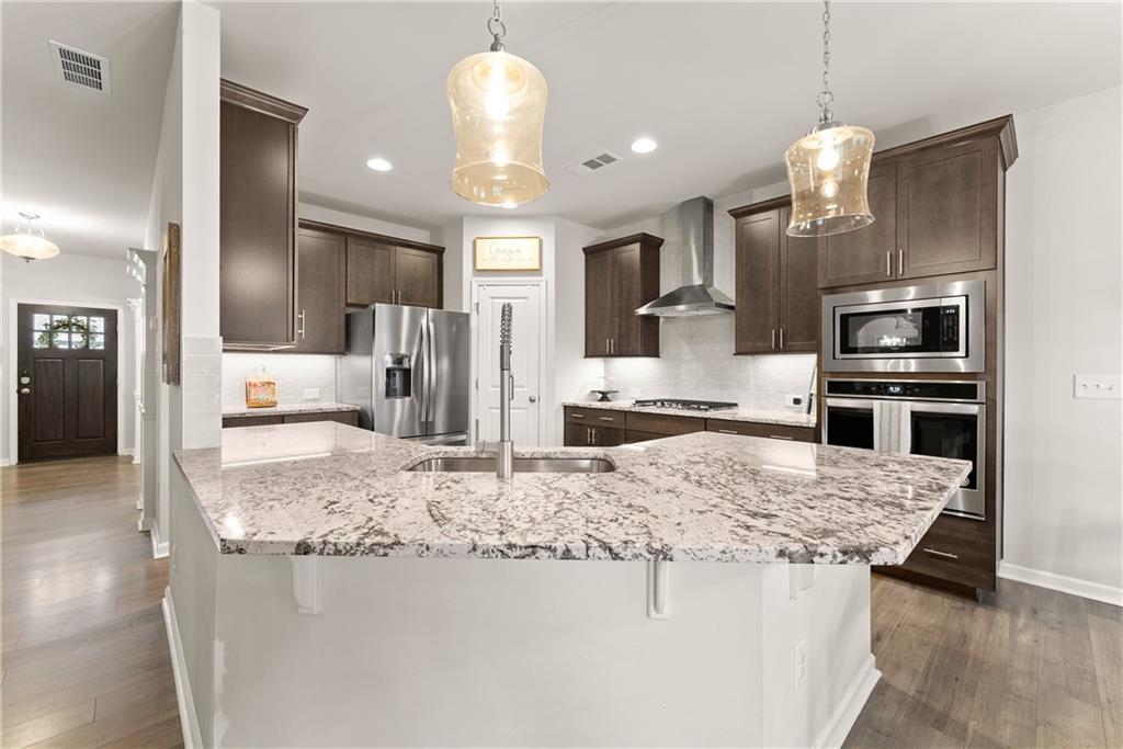 Cumming, Georgia, 30028, United States, 5 Bedrooms Bedrooms, ,4 BathroomsBathrooms,Residential,For Sale,1944997