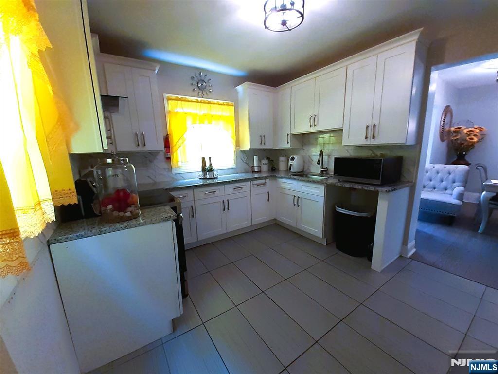 Paterson, New Jersey, 07504, United States, 5 Bedrooms Bedrooms, ,5 BathroomsBathrooms,Residential,For Sale,1837815
