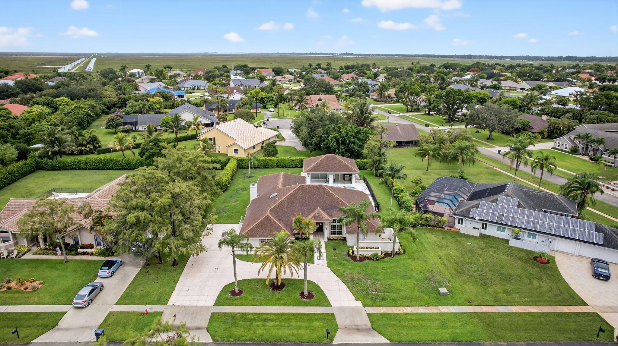 Wellington, Florida, 33414, United States, 5 Bedrooms Bedrooms, ,4 BathroomsBathrooms,Residential,For Sale,1978857