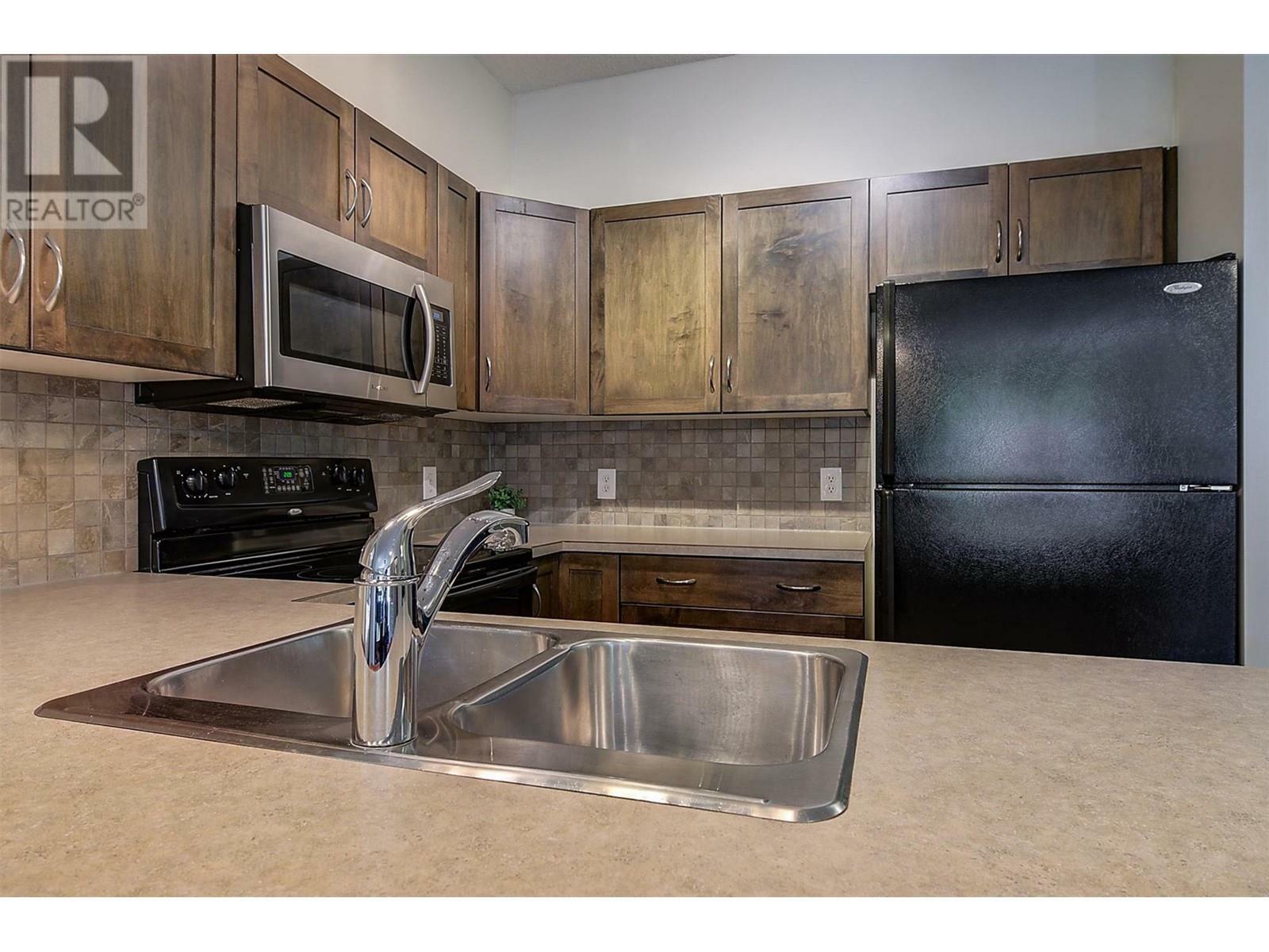 KELOWNA, British Columbia, V1Y 1G6, CA, 2 Bedrooms Bedrooms, ,2 BathroomsBathrooms,Residential,For Sale,1961350