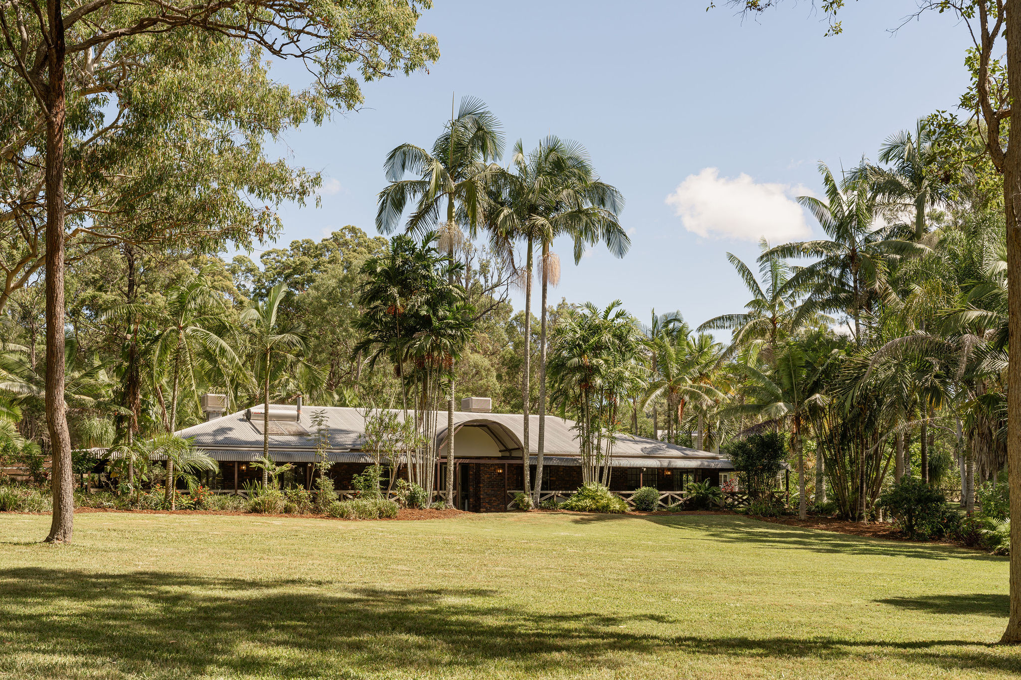 Tranquil Acreage Paradise with Triple Living Amenities 
