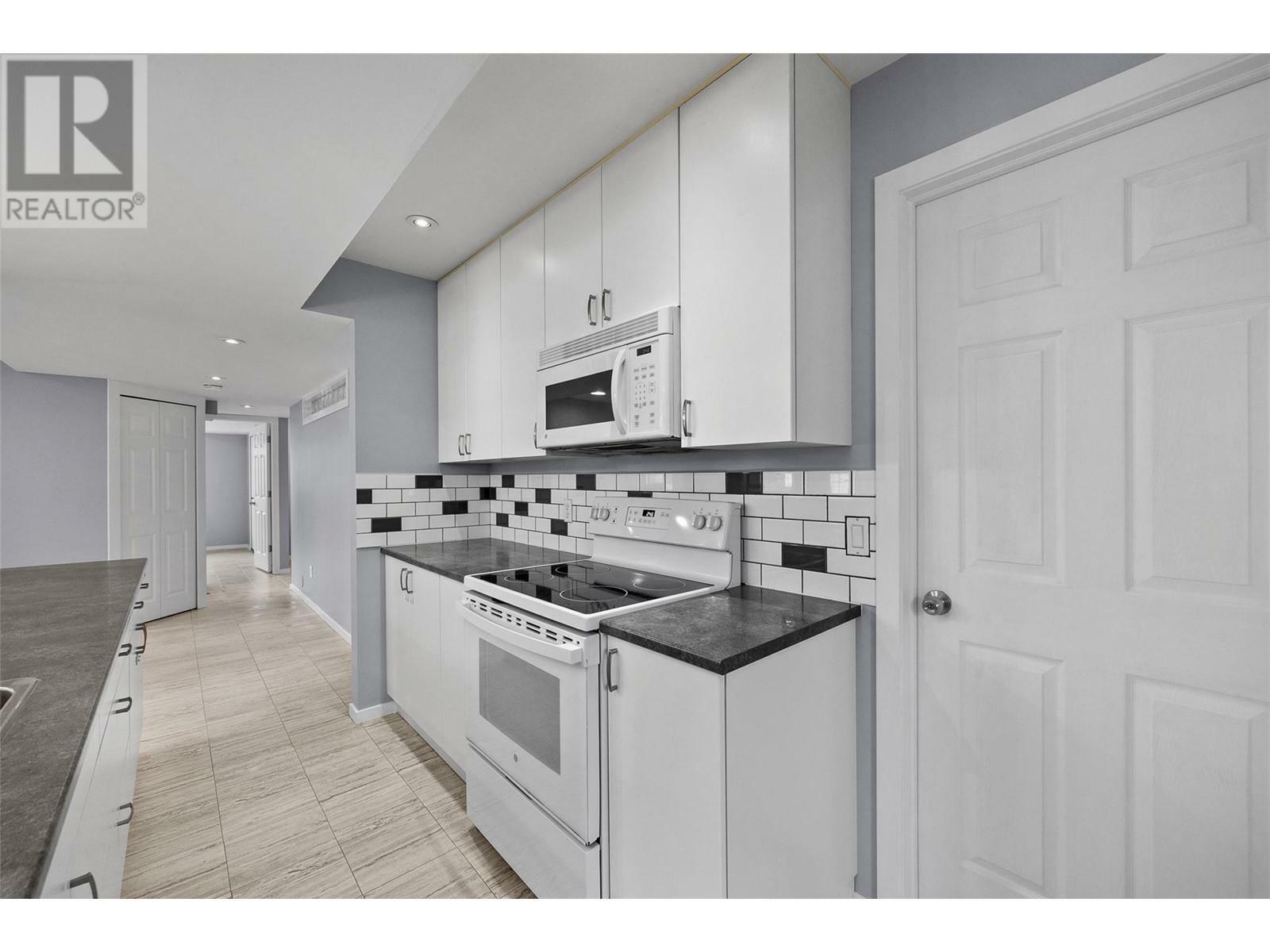 KELOWNA, British Columbia, V1P 1N8, CA, 6 Bedrooms Bedrooms, ,4 BathroomsBathrooms,Residential,For Sale,1837090