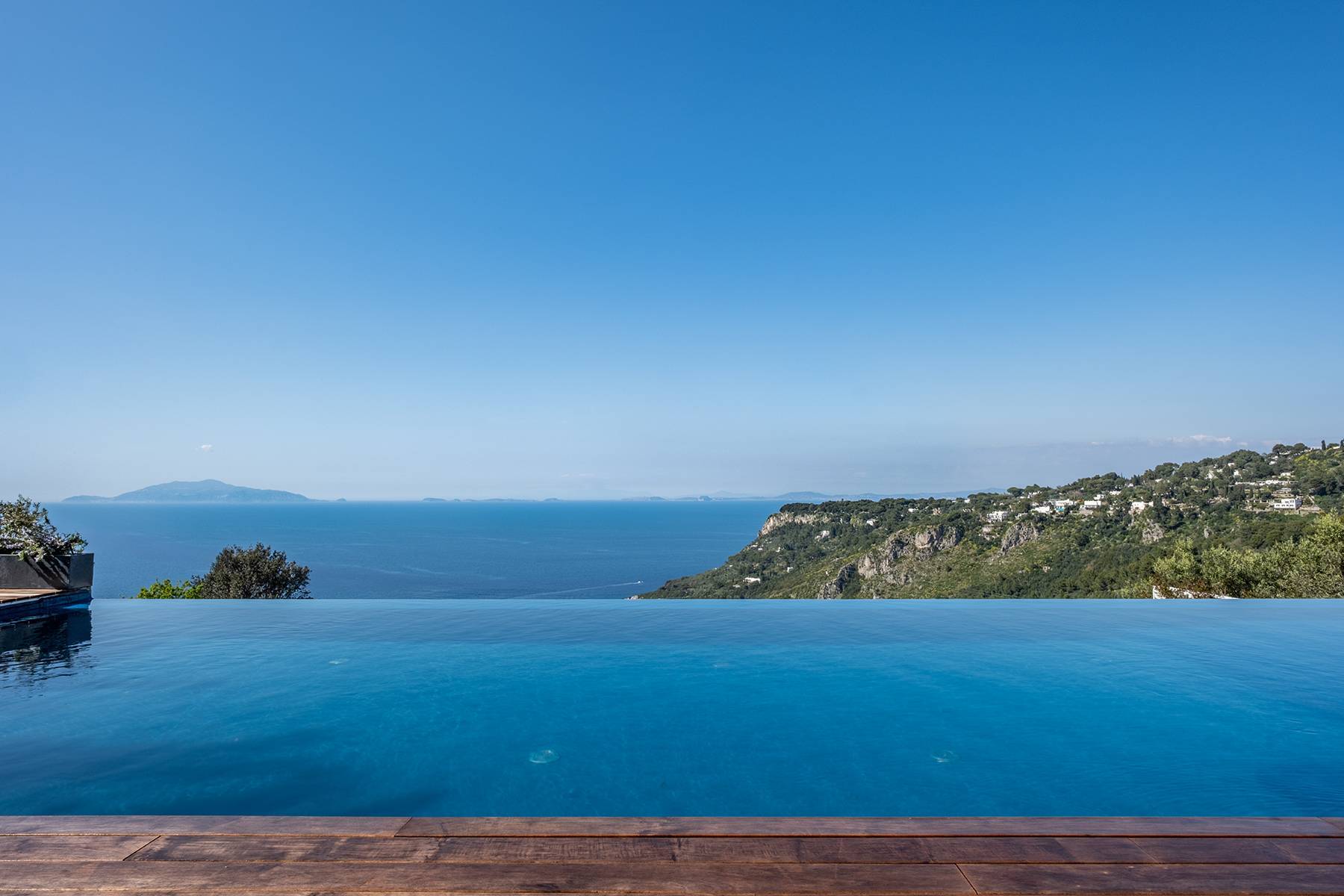 Contemporary design villa with infinity pool and olive grove 