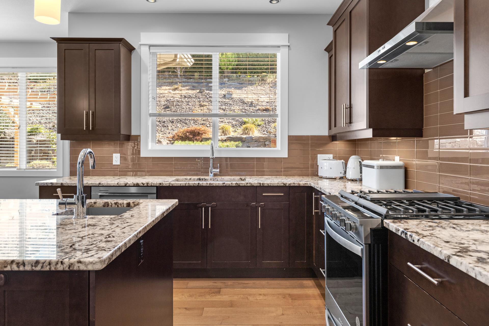 KELOWNA, British Columbia, V1W 5K2, CA, 5 Bedrooms Bedrooms, ,3 BathroomsBathrooms,Residential,For Sale,1960924