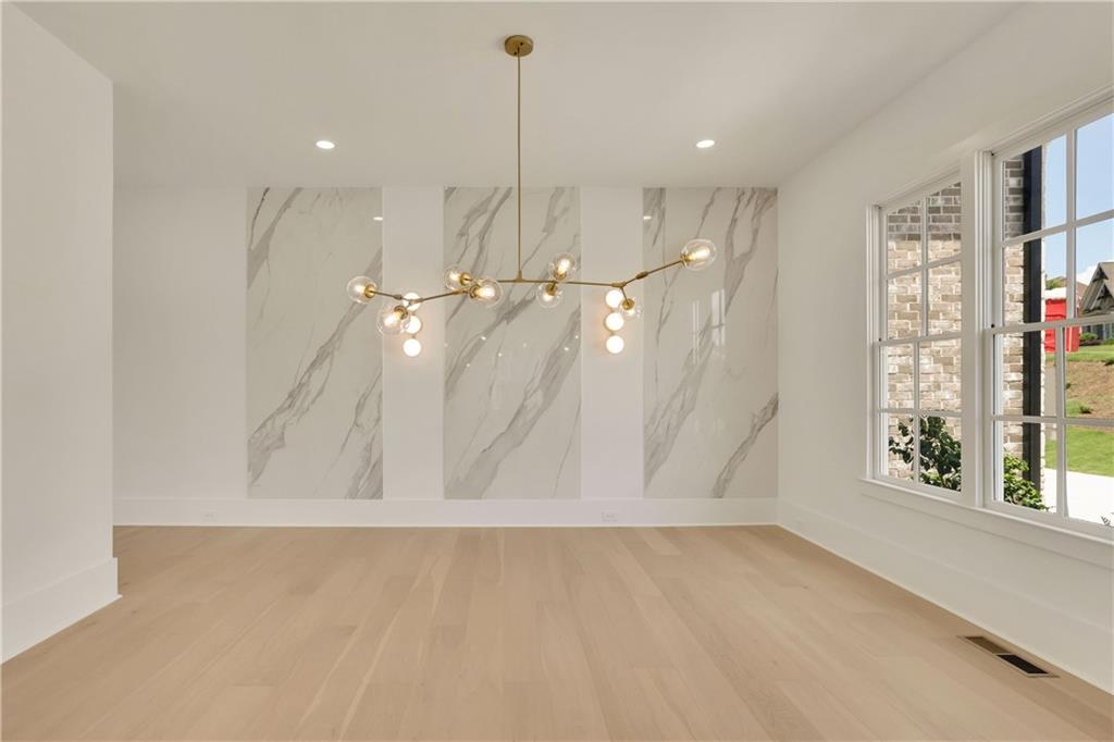 Suwanee, Georgia, 30024, United States, 6 Bedrooms Bedrooms, ,7 BathroomsBathrooms,Residential,For Sale,1795311