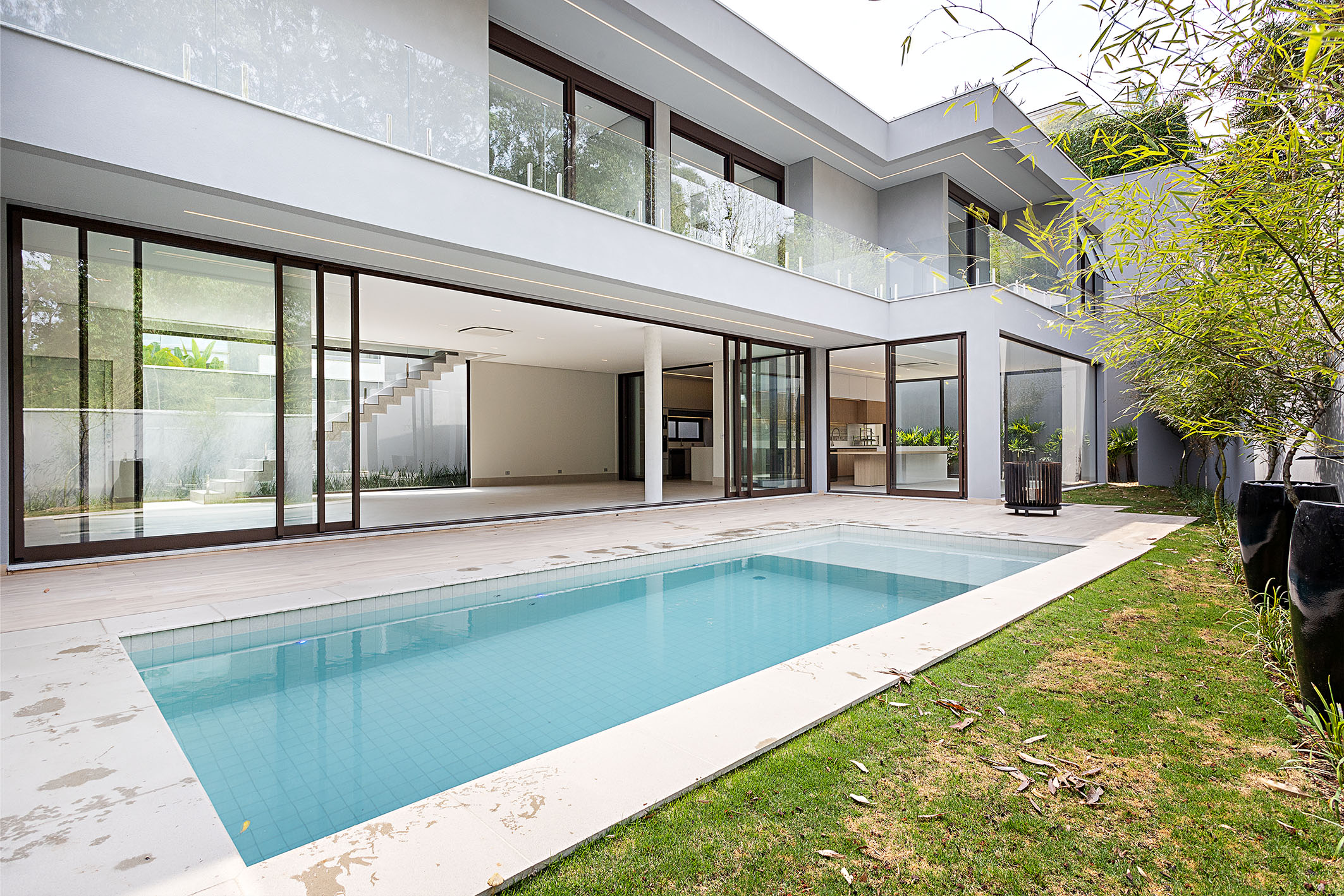 Contemporary-style house surrounded by greenery