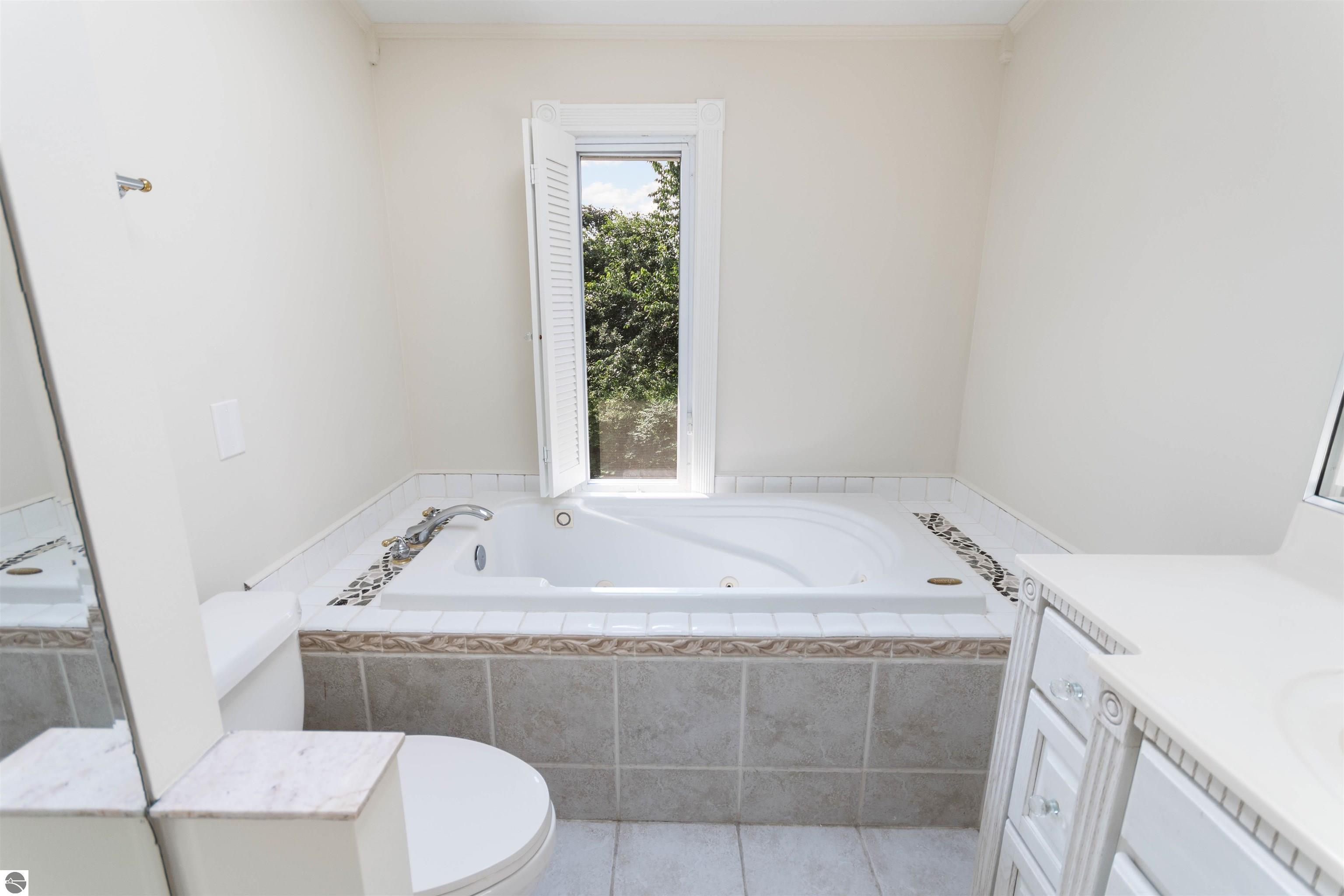 Traverse City, Michigan, 49686, United States, 4 Bedrooms Bedrooms, ,2 BathroomsBathrooms,Residential,For Sale,1908664