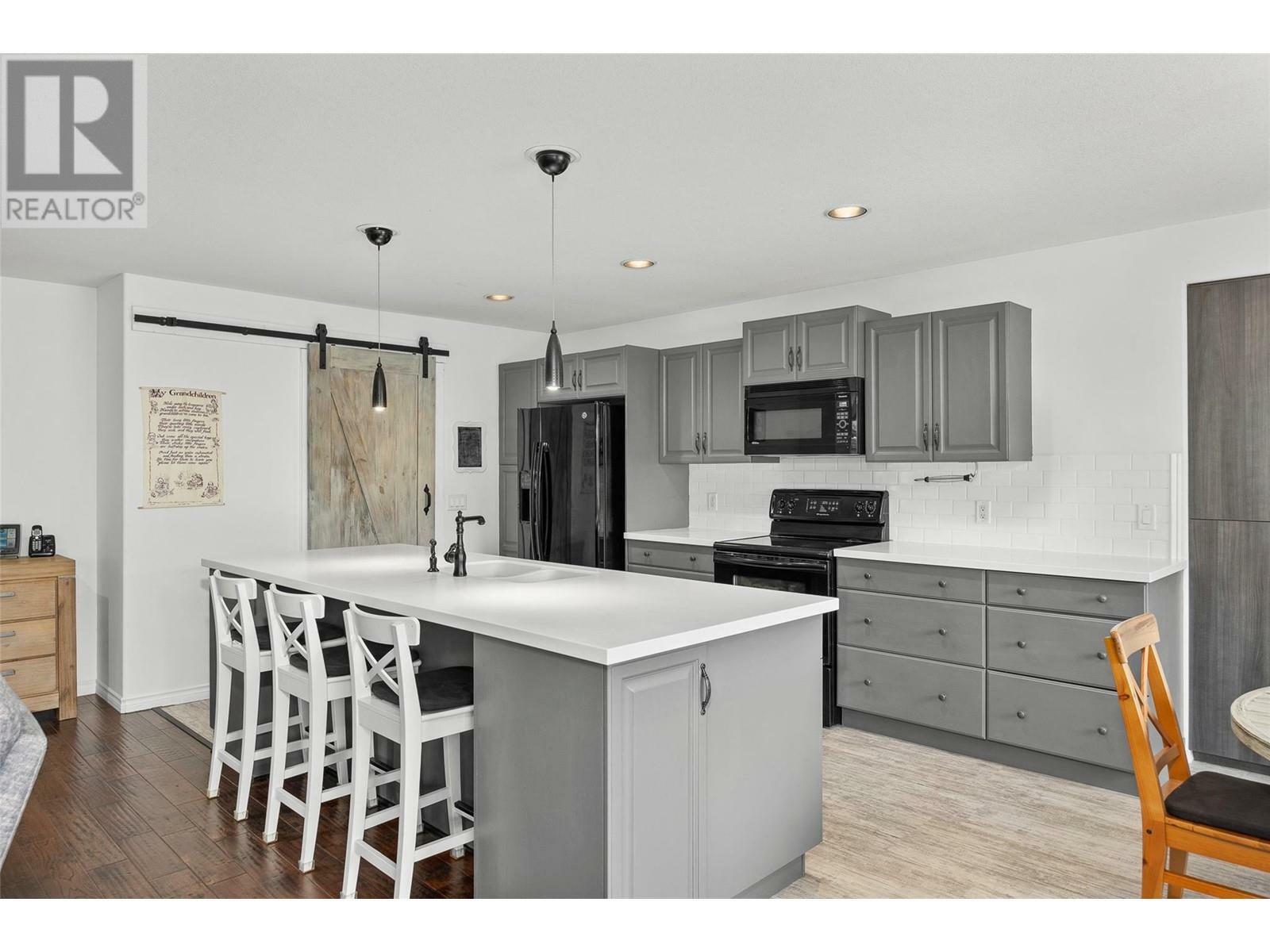 KELOWNA, British Columbia, V1P 1N8, CA, 6 Bedrooms Bedrooms, ,4 BathroomsBathrooms,Residential,For Sale,1837090