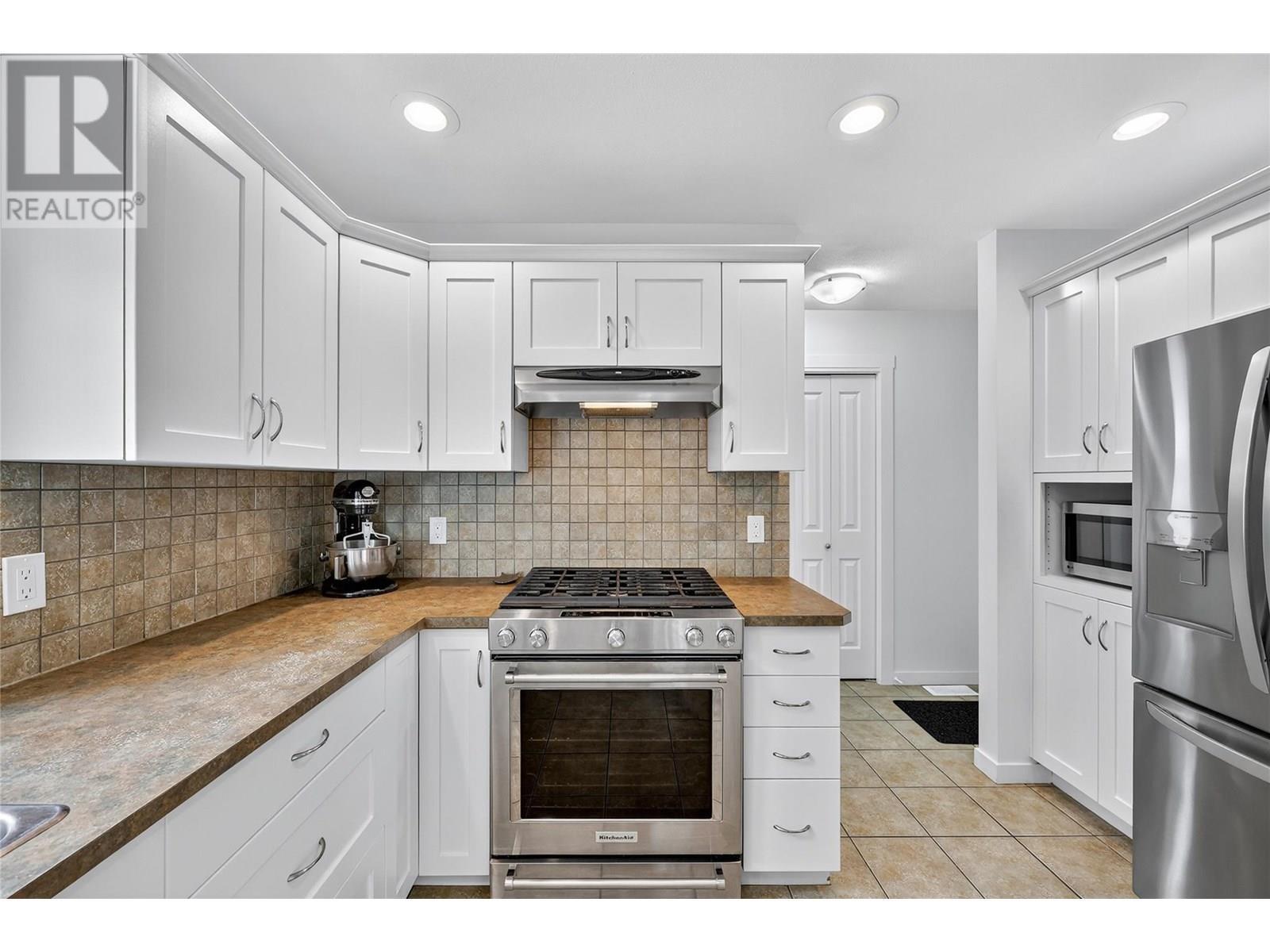KELOWNA, British Columbia, V1W 4X9, CA, 4 Bedrooms Bedrooms, ,3 BathroomsBathrooms,Residential,For Sale,1898520