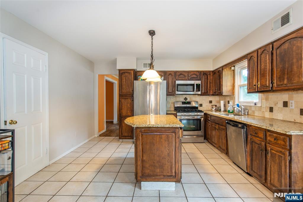 Wayne, New Jersey, 07470, United States, 4 Bedrooms Bedrooms, ,3 BathroomsBathrooms,Residential,For Sale,1857394