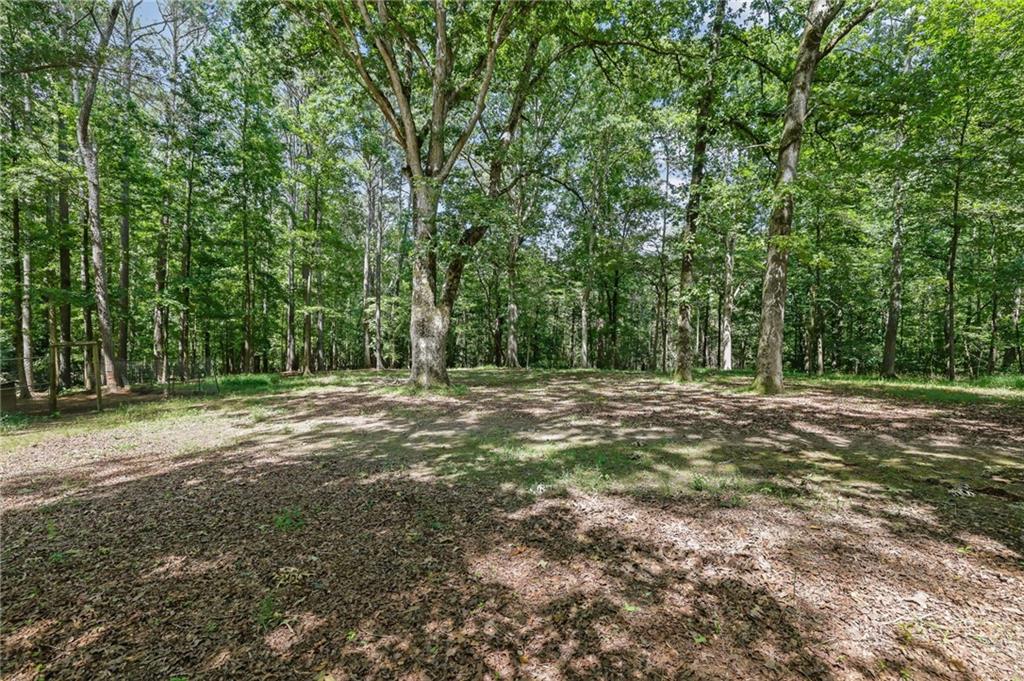 Cumming, Georgia, 30028, United States, 4 Bedrooms Bedrooms, ,3 BathroomsBathrooms,Residential,For Sale,1977231