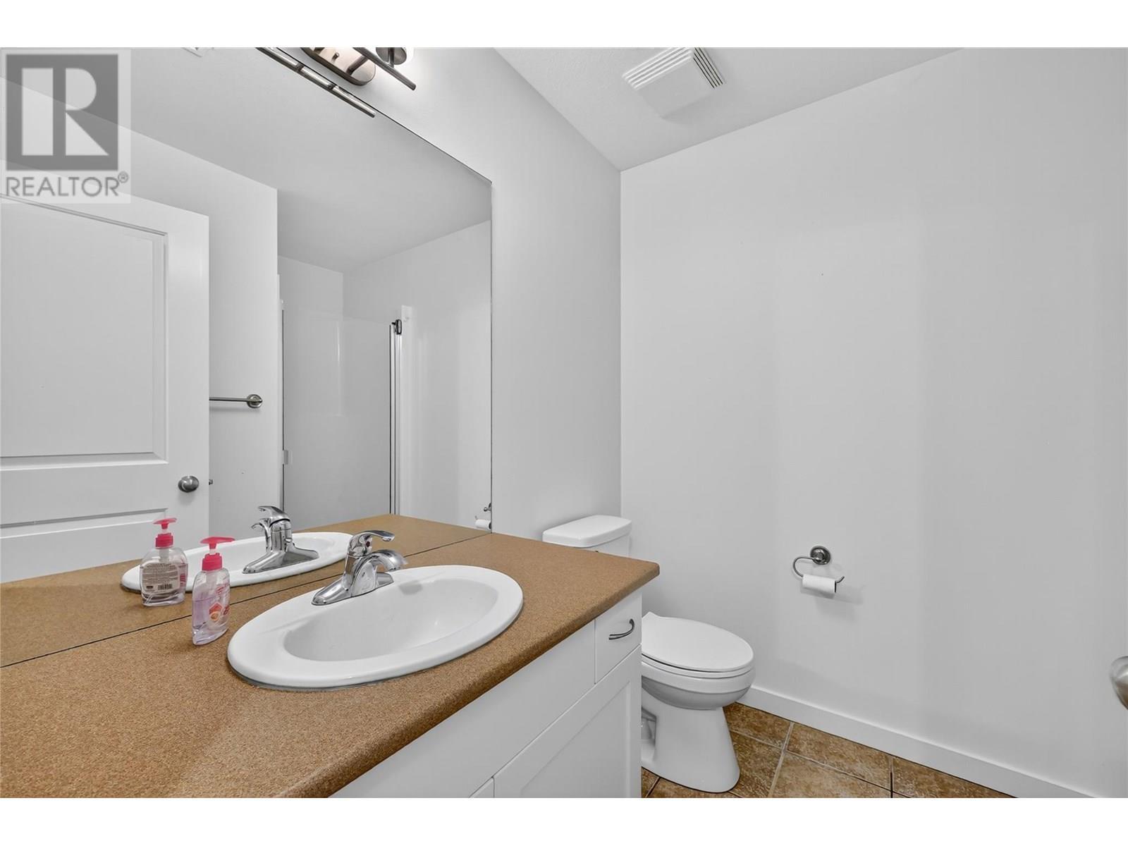 KELOWNA, British Columbia, V1W 4X9, CA, 4 Bedrooms Bedrooms, ,3 BathroomsBathrooms,Residential,For Sale,1898520
