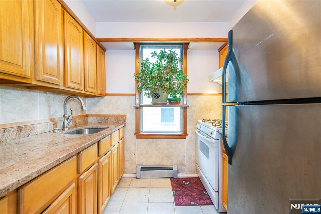 Clifton, New Jersey, 07014, United States, 5 Bedrooms Bedrooms, ,3 BathroomsBathrooms,Residential,For Sale,2000978