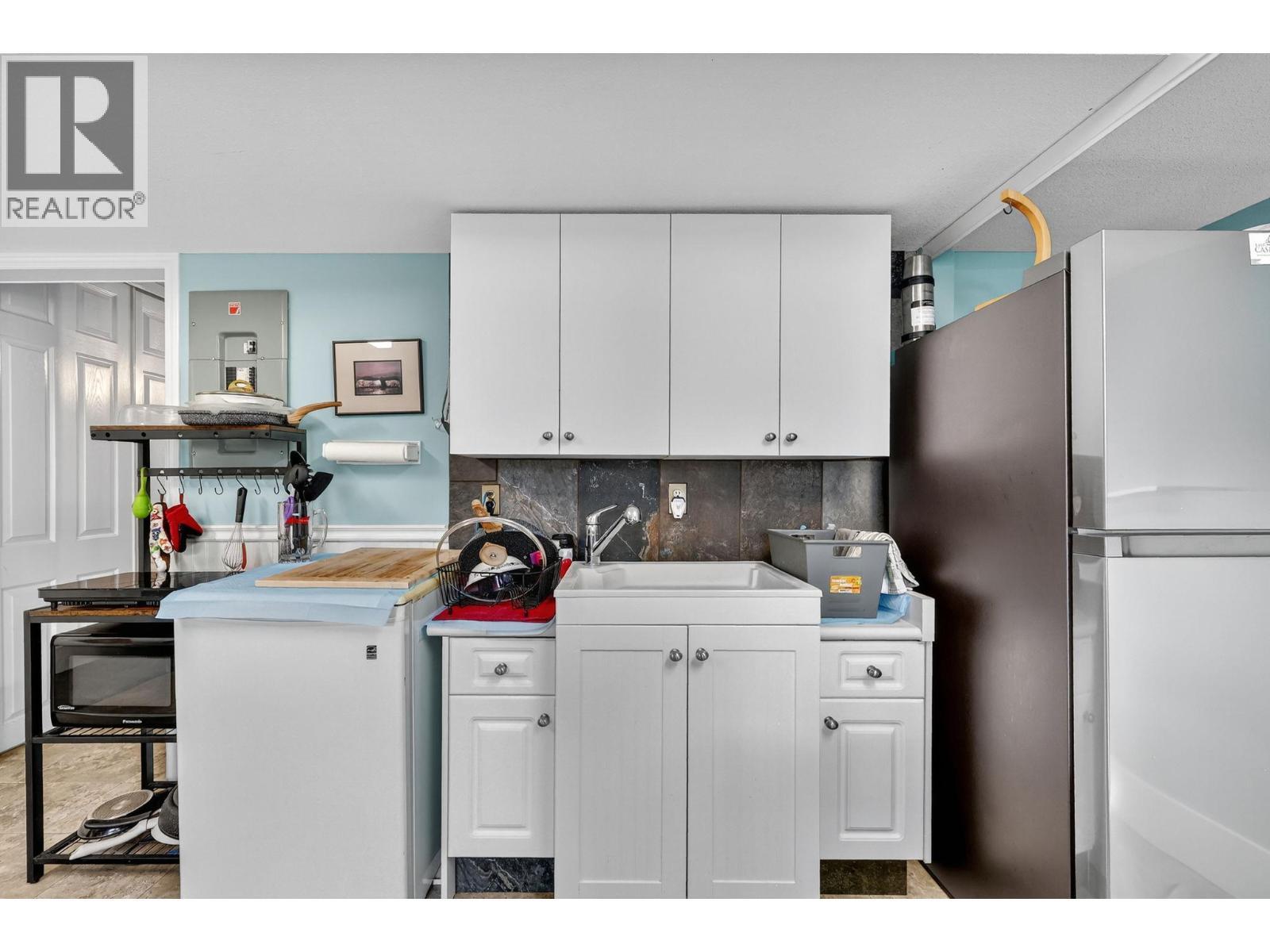KELOWNA, British Columbia, V1X 7T6, CA, 4 Bedrooms Bedrooms, ,2 BathroomsBathrooms,Residential,For Sale,1918347