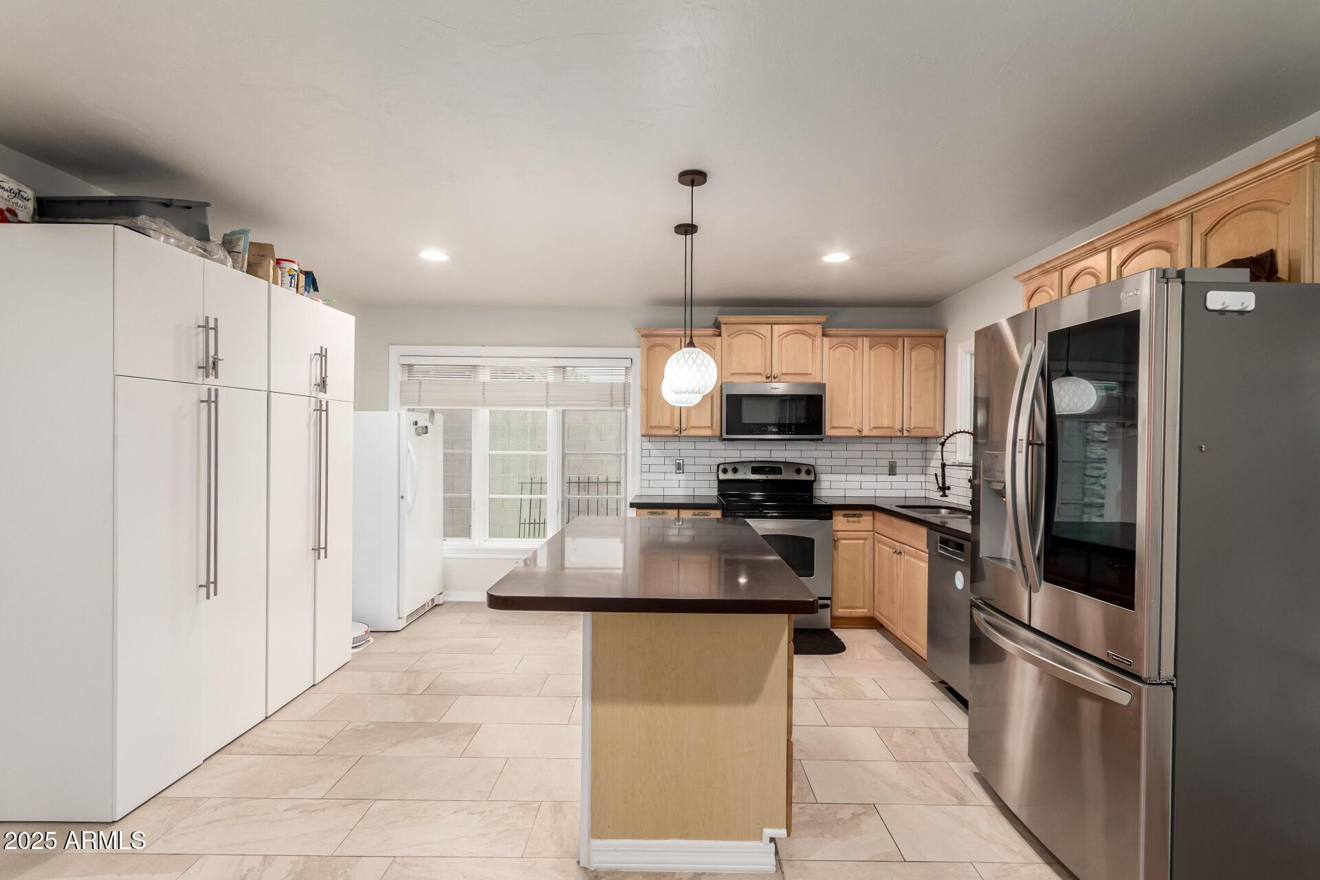 Phoenix, Arizona, 85007, United States, 4 Bedrooms Bedrooms, ,3 BathroomsBathrooms,Residential,For Sale,1980366